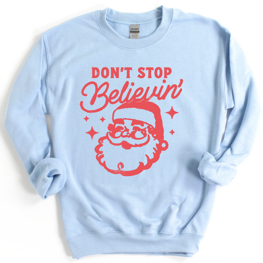 Santa Don't Stop Believing Gildan Crew Sweatshirt